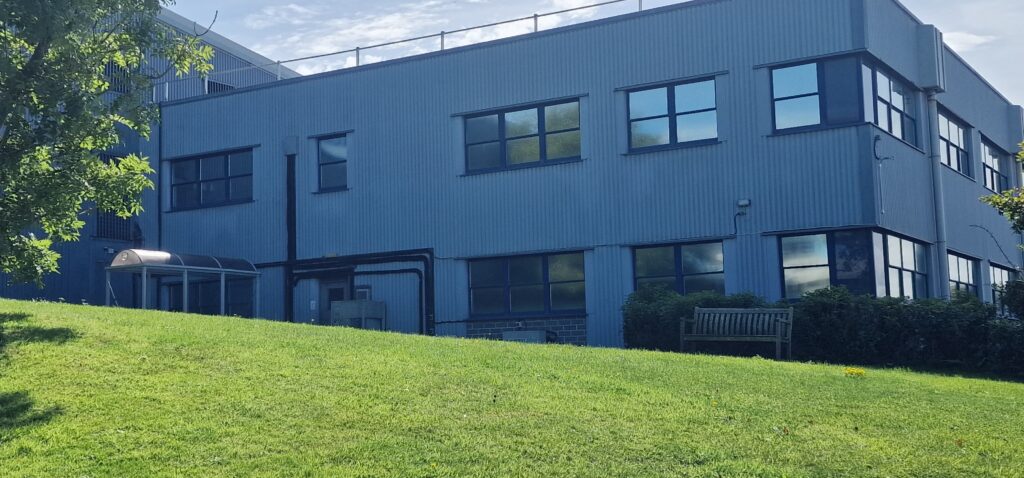Building cladding been cleaned by removing dirt on surface.