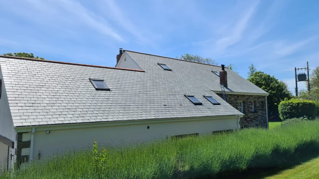 Cleaned slate tiles after roof cleaning.