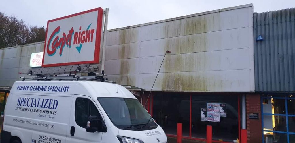 Cladding covered in green algae.