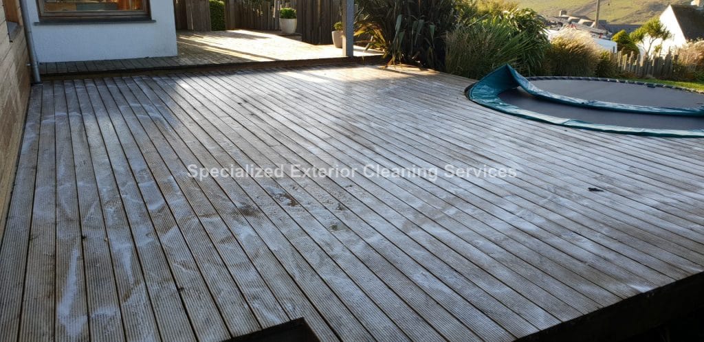 Sprayed treatment on wooden decking.