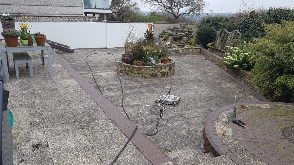 Patio area covered in dirt.